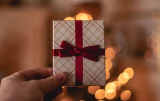 Gift giving in the workplace with a reimagined Secret Santa